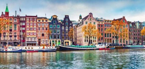 Panoramic autumn view of Amsterdam city. Famous Dutch channels a © Andrew Mayovskyy - stock.adobe.c