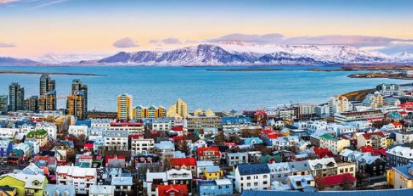 Aerial panorama of downtown Reykjavik at sunset with colorful ho © mandritoiu - stock.adobe.com